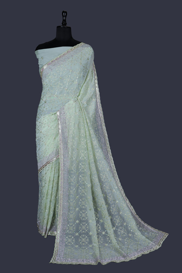 Yellow Green saree in Cristal with Ton-to-Ton thread work with Heavy Jarkan Border.